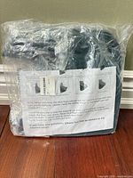 sealed package front showing mud flaps and instruction sheet
