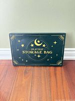 Front of sealed box showing Playmat Storage Bag graphics