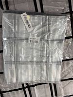 sealed pocket organizer in original plastic wrap