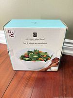 front of retail box displaying President's Choice porcelain salad bowl set