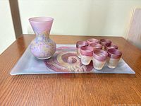 Full set: carafe, eight shot glasses, rectangular tray