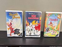 Front view of the three Disney Black Diamond VHS tapes