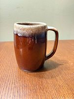 Front view showing brown body and tan drip rim