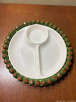 front view showing full platter, divided sections and olive rim