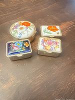 Top view of all four enamel pill boxes closed