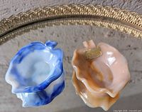 Top view of both ashtrays showing colors and shape