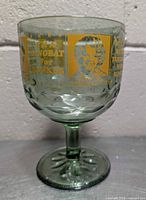 Front view showing Archie Bunker portrait and slogan