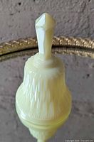 Full view of bell showing body and handle