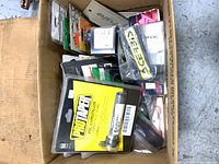 Box view showing assorted packaged motorcycle parts