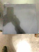 Top view of closed black cash drawer