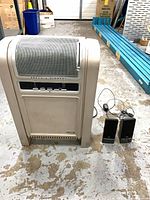 Heater front and speakers together to show lot contents and relative size