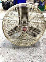 Front view of fan showing full cage and blades