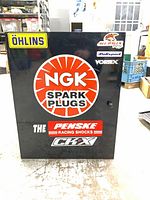 Front view showing NGK Spark Plugs logo and assorted decals