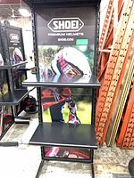 Front view showing Shoei branding panel and two shelves