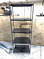 Full front view of the five-shelf black metal unit