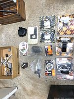 Overview of all packaged motorcycle parts laid out on floor