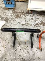 Black tubular sport rear stand showing main bar and arms