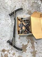 Wheel clamp assembly and box of smaller adapter parts