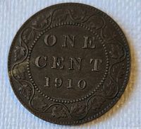 Reverse of 1910 Canadian large cent showing ONE CENT 1910 within maple-leaf vine border