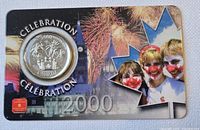 Front of carded 2000 Celebration quarter showing coin and graphics