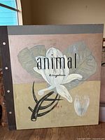 Front view of full canvas showing flower illustration and text