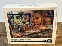 Front of sealed puzzle box showing title, image, piece count, size and age rating