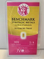 Front of Benchmark Strategic Metals assay card displaying certificate and encapsulated gold bar