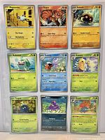 Front view of all nine Pokémon cards in binder sheet
