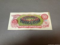 Reverse side of $50 note showing RCMP Musical Ride