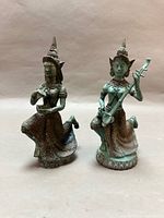 Front view both bronze Thai deity figurines