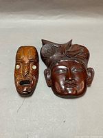 Both wood masks side by side