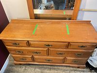 Top view of Roxton dresser showing wood finish and attached mirror