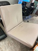 Cot unfolded showing mattress surface and frame layout