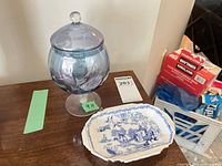 Blue glass compote and Royal Albert platter grouped on table