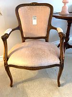 Front view of Louis XV style armchair