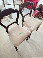 Front view of two matching balloon back chairs