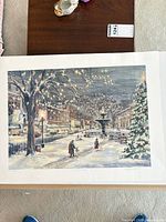 Full view of unframed watercolour showing winter city scene
