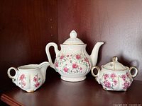 Full set: teapot, sugar bowl, creamer on shelf