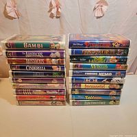 Front view of both tape stacks showing 20 Disney clamshell VHS cases
