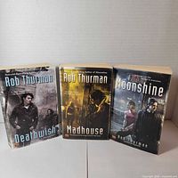 Front covers of all three Rob Thurman paperbacks