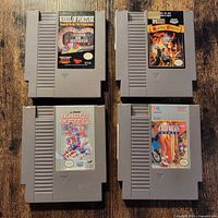 Four NES cartridges front view showing titles