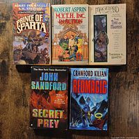 Front covers of all five paperback books