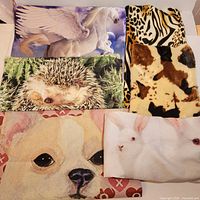 Six pillow covers laid out showing each animal design