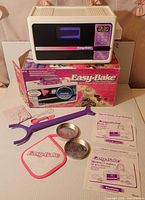 Oven, box, accessories laid out