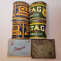Front view showing all six tins