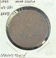 Obverse side of 1843 Nova Scotia penny token in holder
