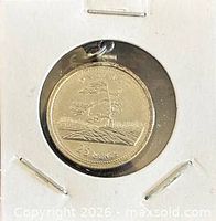 Front view showing Ontario Jack pine reverse in bezel