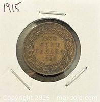 Reverse of 1915 Canadian one cent coin in holder