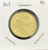 coin in 2x2 flip, reverse side visible