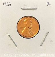 Obverse of 1963 Lincoln cent in holder